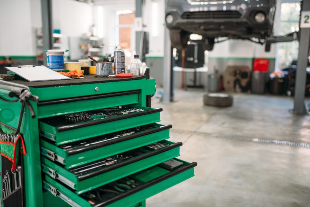 Car service tool box with pull-out shelves
